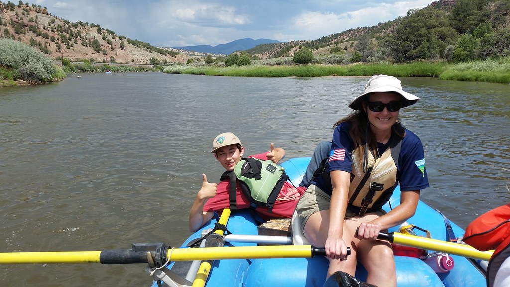 Two volunteers on a raft in the Colorado River