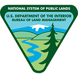 Bureau of Land Management logo with a river, tree, hills, and text for the U.S. Department of the Interior