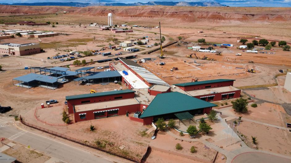 Aerial view of construction site in arid landscape.