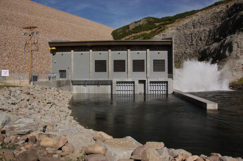 View of Jordanelle Hydroelectric Power Plant looking upstream across Provo River toward Jordanelle Dam