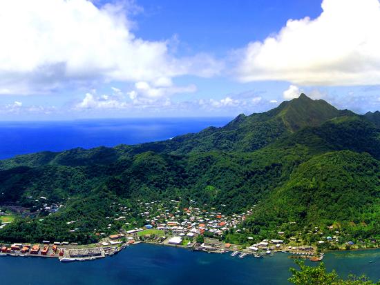 Panoramic view of island harbor with tropical landscape