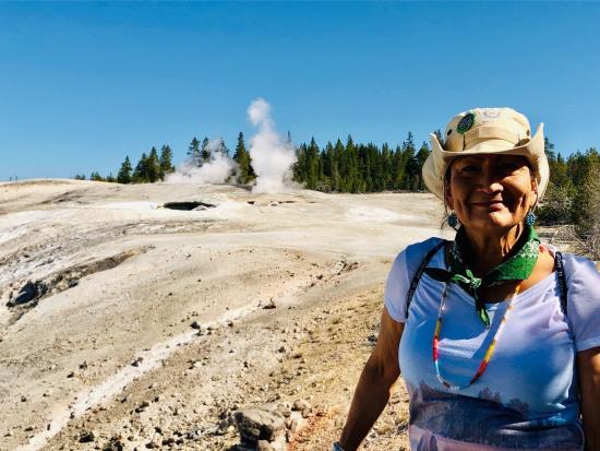 Secretary Haaland stands at Yellowstone National Park.