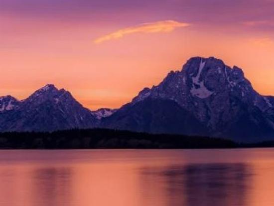 Beautiful mountains beneath a pink sky