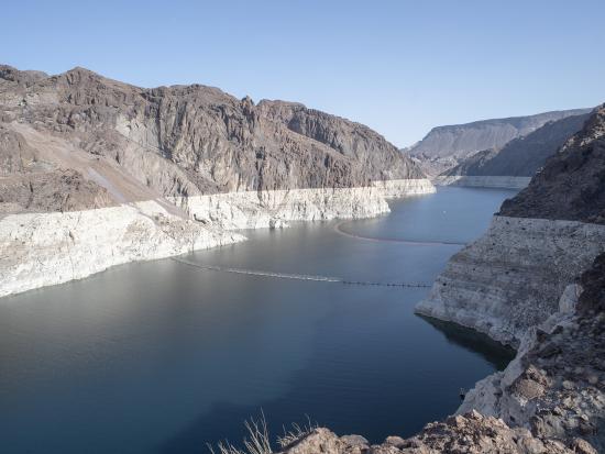 River cutting through steep gray cliffs.