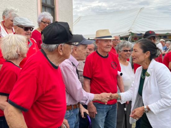 Secretary Haaland greets alumni of the Blackwell School in Marfa, Texas.