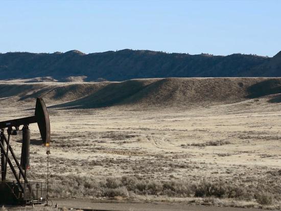 An oil drill on a Wyoming plain.