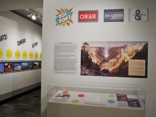 Title wall and introductory panel and vitrine for the "DOI Pop!" exhibition