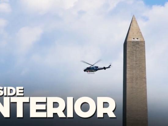 Helicopter flying near Washington Monument