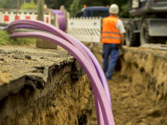 Broadband cable infrastructure through dug out ditch.