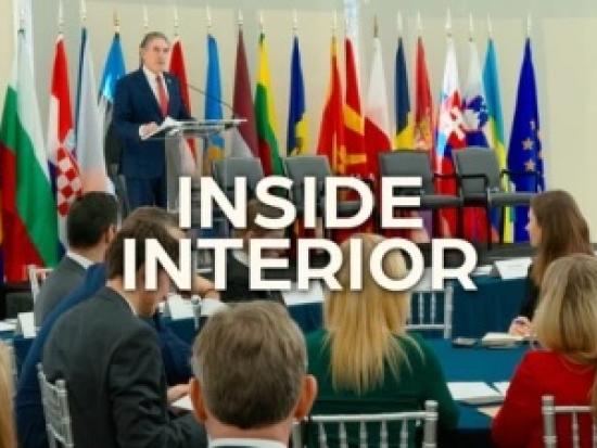 Secretary Burgum speaks from a podium