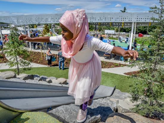 Child plays at Cully Park.