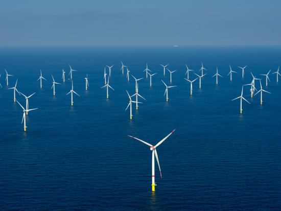Handful of offshore windmills in the ocean