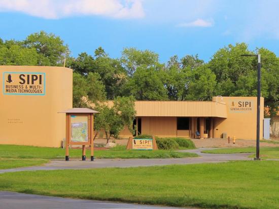 Tan brown buildings on the Southwestern Indian Polytechnic Institute’s campus