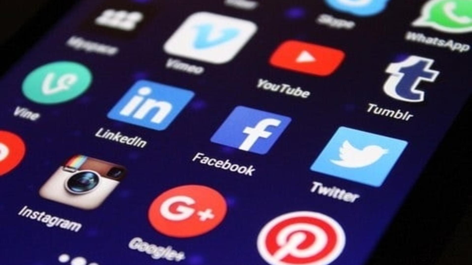 Picture of social media company logos on phone screen