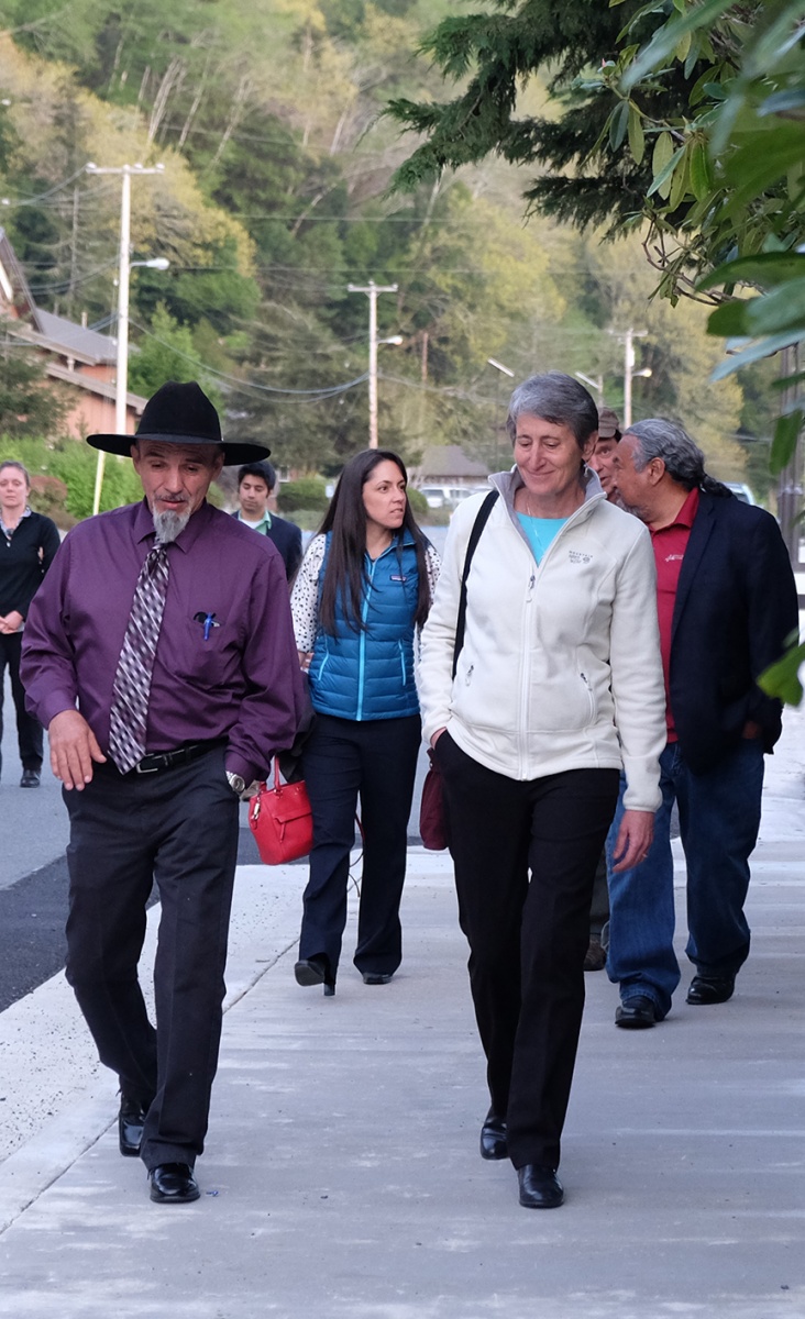 Secretary Jewell (right) walks with Thomas P. O'Rourke (left), Chairman of the Yurok Tribe